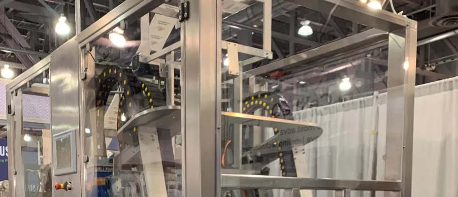 CeltheQ BLM sleeve labeling machine displayed at trade show